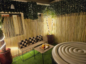 Appartement avec patio et jaccuzzi